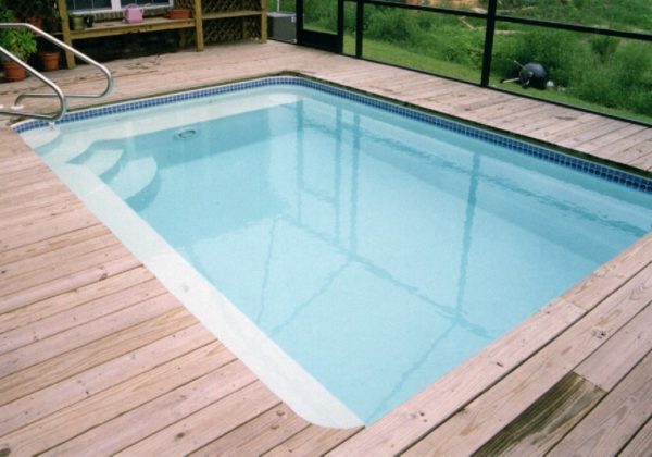 The Sea Isle is a petite, rectangular fiberglass swimming pool. It includes a wide array of bench seating leading & corner entry steps. Lastly, its flat bottom design makes it extremely comfortable for cooling off and soaking for water therapy.