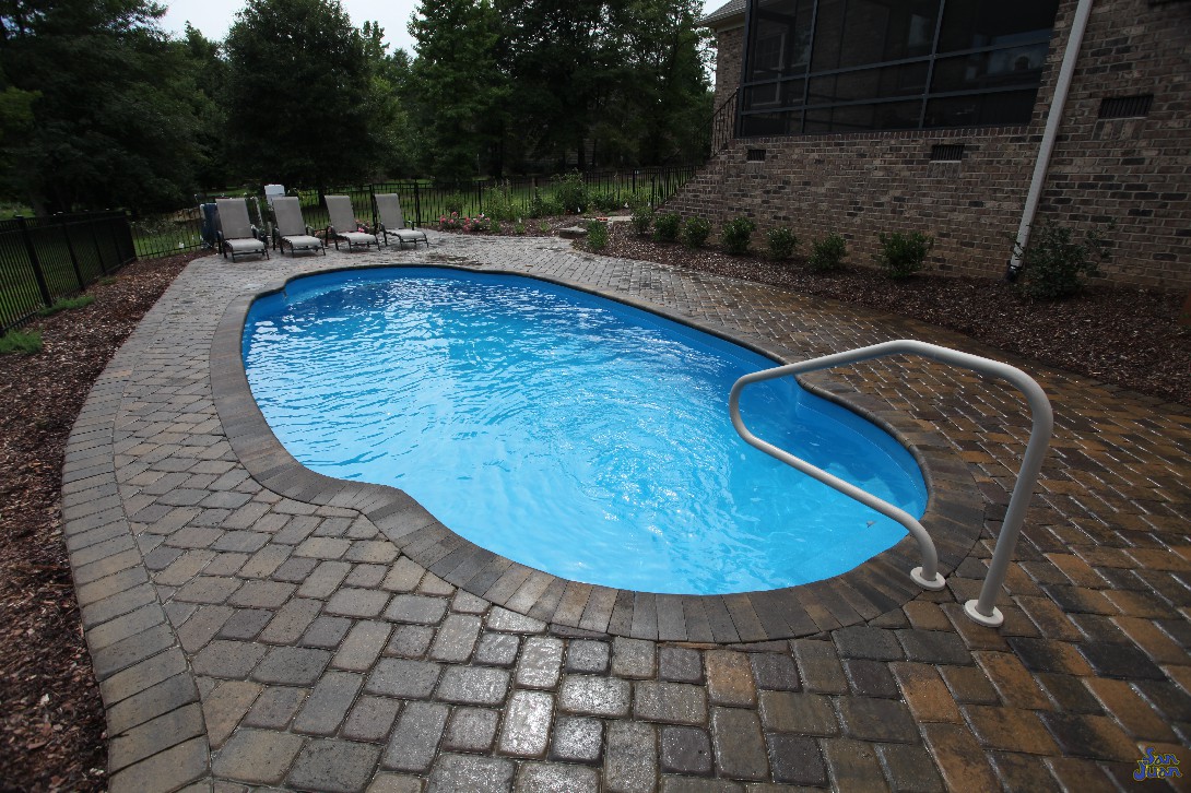 The Pompano Beach is an elegant redesign of a classic Roman Pool Shape. This beautifully designed fiberglass pool includes a wide deep end bench & curved entry steps. It's standard hopper layout is a classic presentation of shallow end to deep end layout. Perfect for your home!