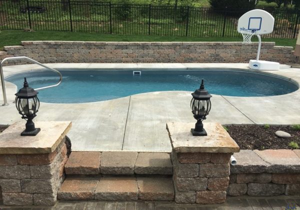 The Sandcastle is a serene free form swimming pool with a 5' 5" deep end. It provides ample bench seating for your swimmers and guest as well as a nice tanning ledge. This is a great swimming pool for those who want to casually swim and relax with friends and family.