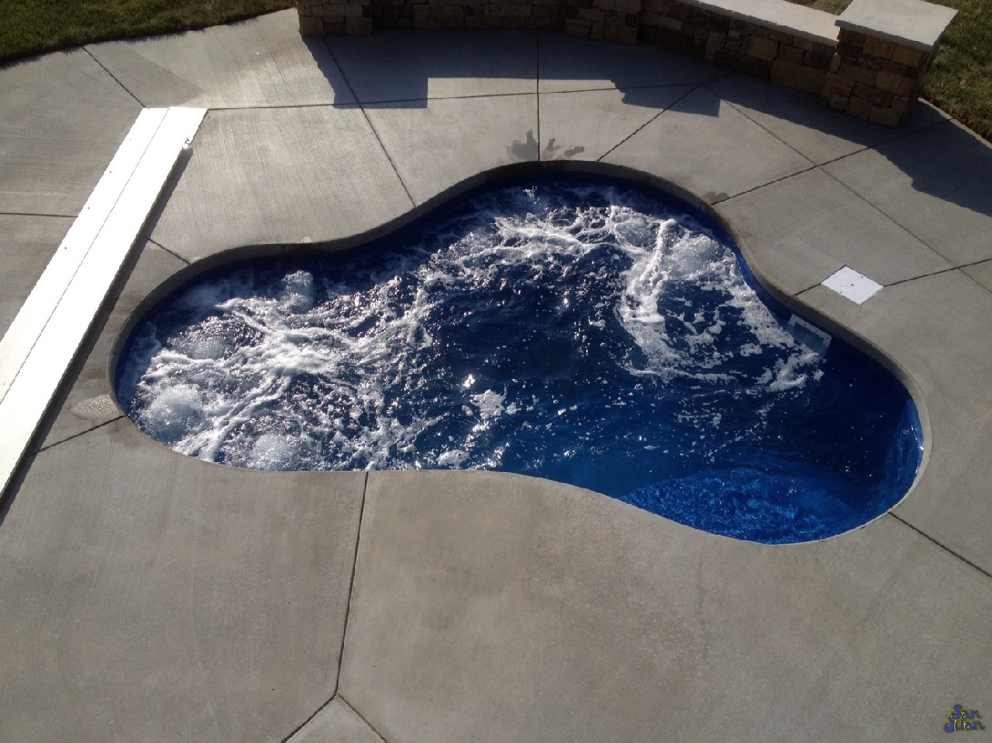 The Montreal Spa is a medium sized fiberglass spa that holds a maximum of 1,925 Gallons. This free form design has less bench seating than the Sydney or Vancouver - comfortably holding 2-4 bathers in its serene waters. This unique spa shape is perfect for a petite backyard or as an addition to any of our fiberglass pool shapes.