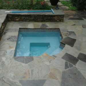 The Cove Spa is a modern fiberglass spa shape that can comfortably hold up to 3 bathers. This modern design is actually our smallest fiberglass spa model - which makes it perfect for small backyards!