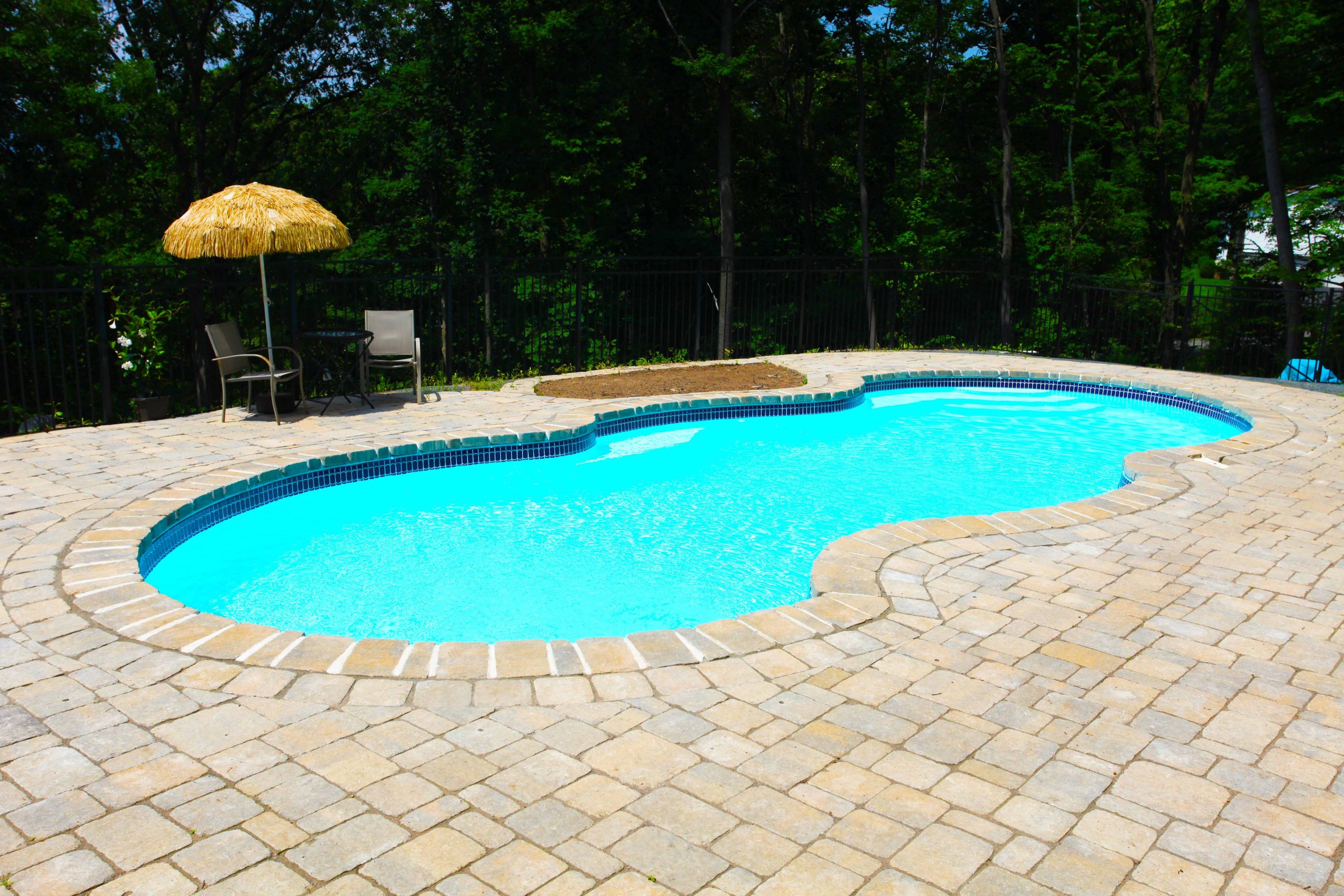 The Mirage is a fully functional fiberglass pool design that enhances your backyard living experience!
