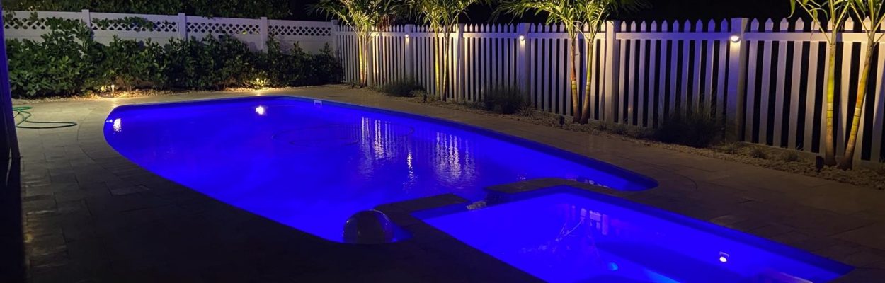 The Olympus is a unique fiberglass pool shape that blends a long rectangular body with modern design features. A dual set of entry steps, deep end swim out bench and attached spa all boost the value of the Olympus.