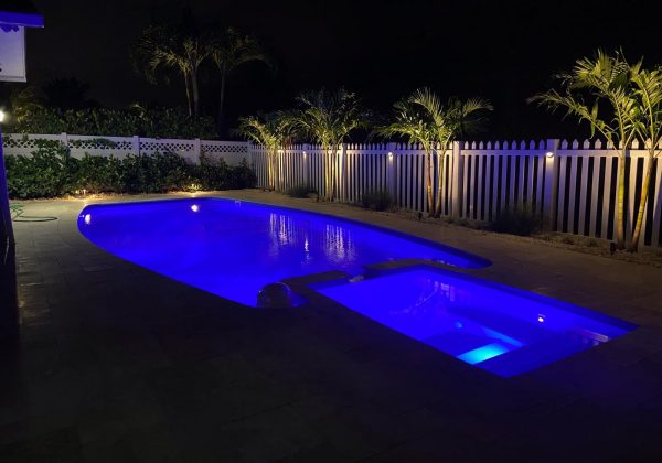 The Olympus is a unique fiberglass pool shape that blends a long rectangular body with modern design features. A dual set of entry steps, deep end swim out bench and attached spa all boost the value of the Olympus.