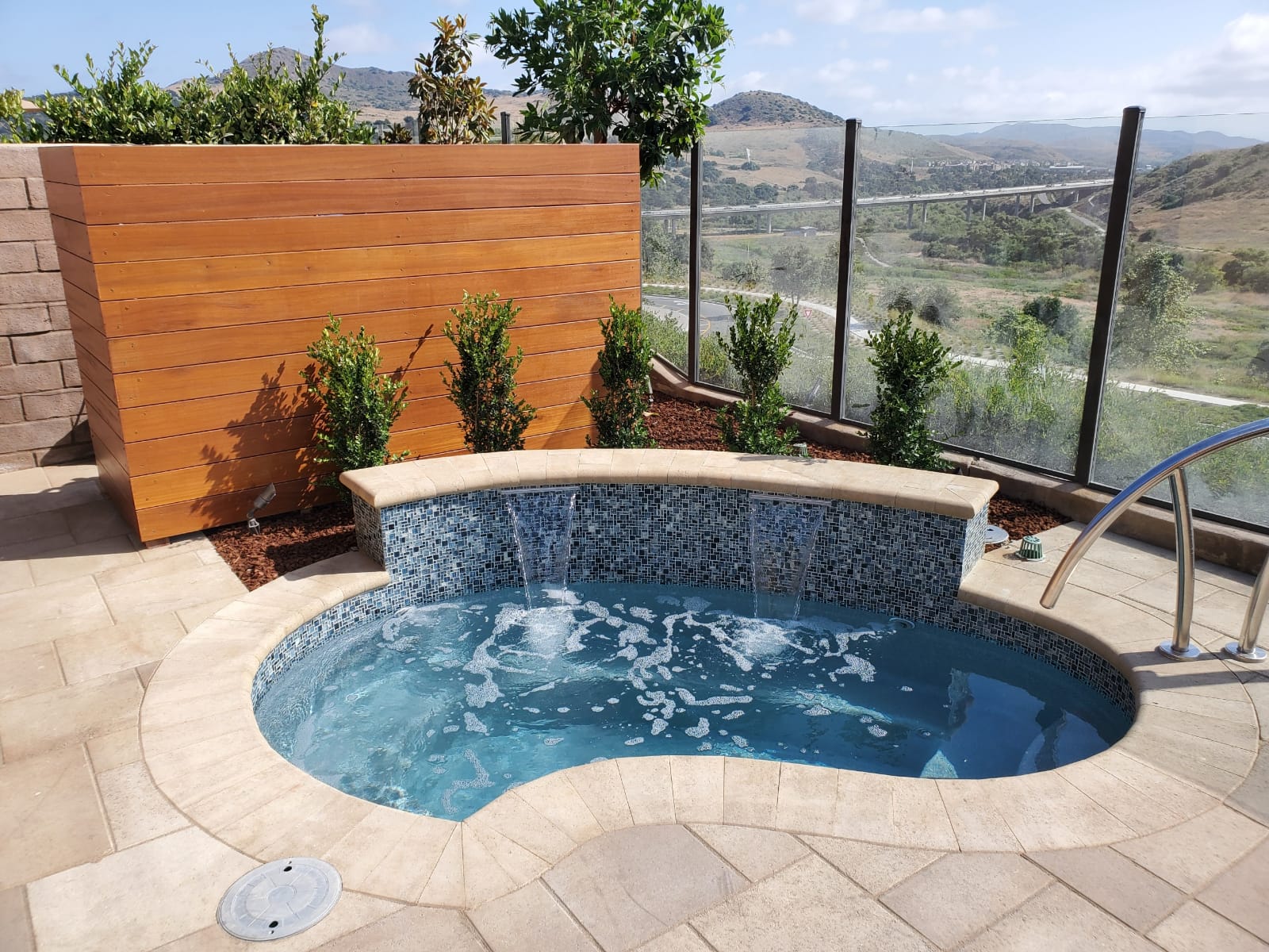 The Royale Spa is a stunning fiberglass spa designed to soothe and relax the soul. Perfectly paired with outdoor landscaping, the Royale Spa blends right into any outdoor oasis!
