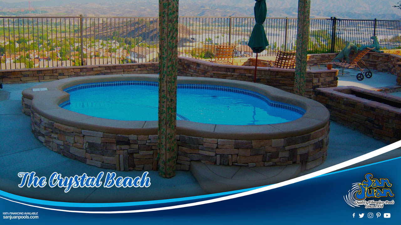The Crystal Beach is a small, free-form fiberglass swimming pool.