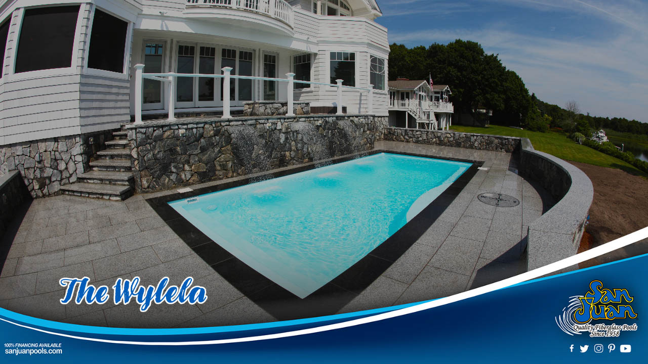 The Wylela is a captivating fiberglass swimming pool that is easy to dress up with beautiful water features.