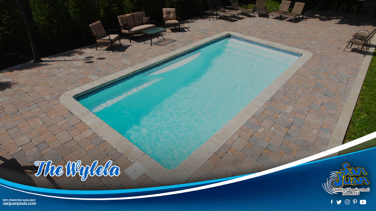 The Wylela is a captivating fiberglass swimming pool that is easy to dress up with beautiful water features.