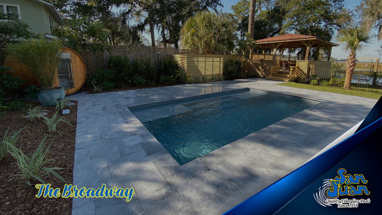 The Broadway is a unique fiberglass pool designed with a horizontal layout